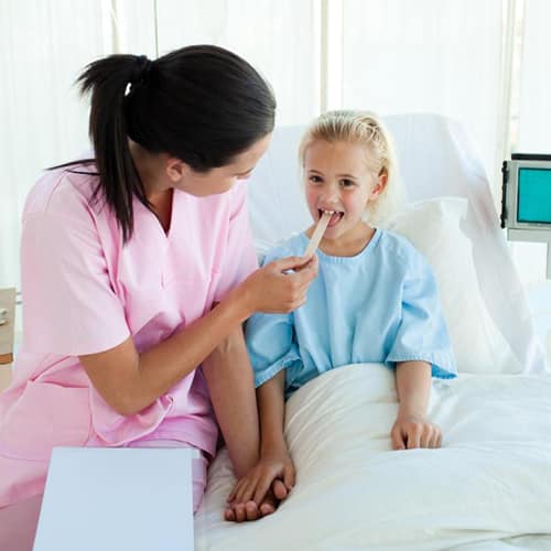 young nurse attending a child patient - Advantage Medical Professionals